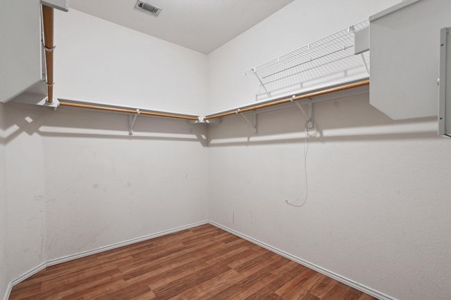 Primary bedroom walk in closet | Image 25