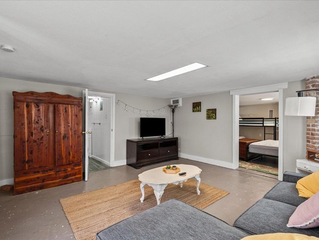 Downstairs apartment living space | Image 19