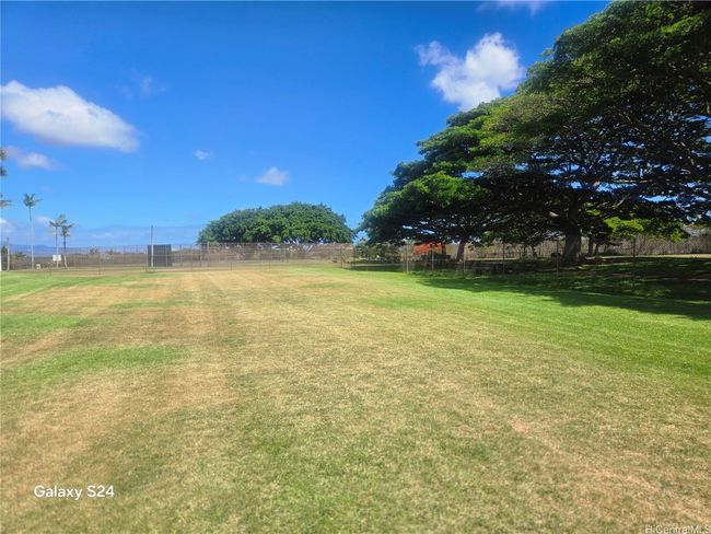 Tennis courts and multiple picnic tables | Image 22