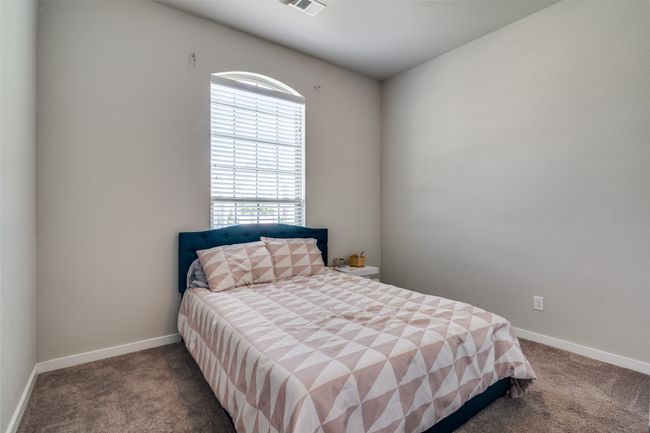 Bedroom featuring carpet floors and baseboards | Image 21