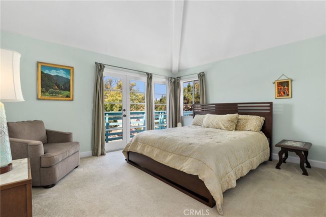 Primary Suite with sweeping ceilings and a private balcony to watch sunsets! Don't miss the walk in closet! | Image 23