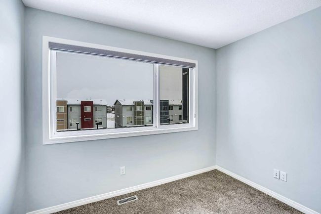 201 - 70 Saddlestone Dr Ne, Townhouse with 2 bedrooms, 3 bathrooms and 1 parking in Calgary AB | Image 23
