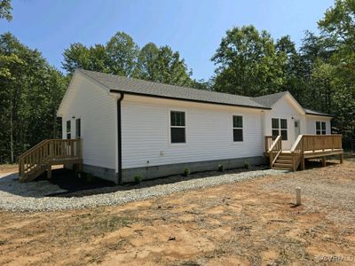 On 2.4 acres, a new construction home of 3 Beds, 2 baths and 1790 sf | Image 1