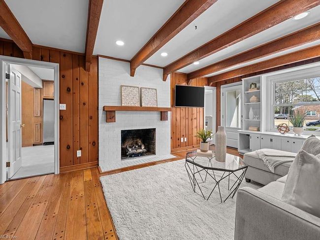 Cozy Den with a Gas Fireplace. This room has it's own entrance! | Image 15