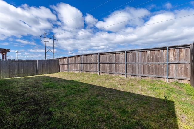 View of yard featuring a fenced backyard | Image 35