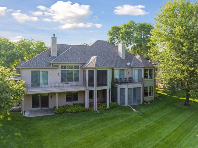 Light pours in—your peaceful perch above the trees. | Image 30