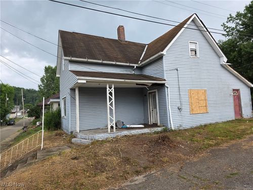 212 Thompson St, Uhrichsville, OH, 44683-1762 | Card Image