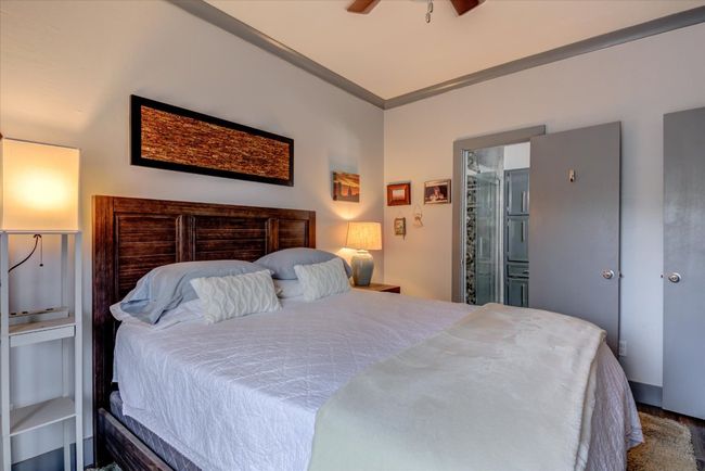 Bedroom with a ceiling fan | Image 10
