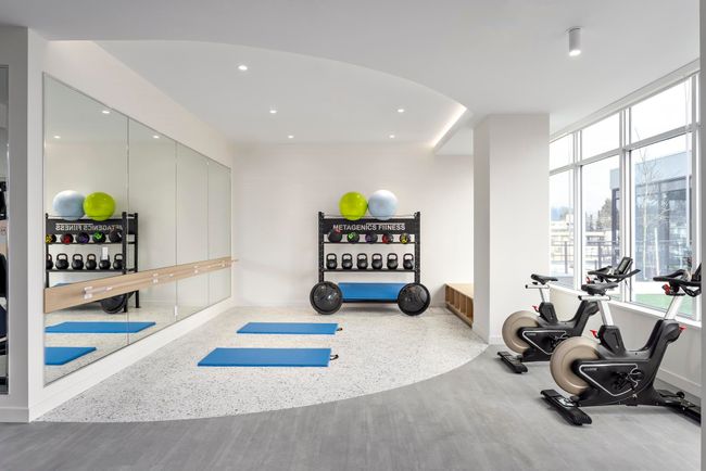 Workout area with recessed lighting and baseboards | Image 9