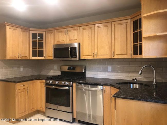 46 Dortmunder Dr, Townhouse with 4 bedrooms, 3 bathrooms and null parking in Manalapan NJ | Image 11