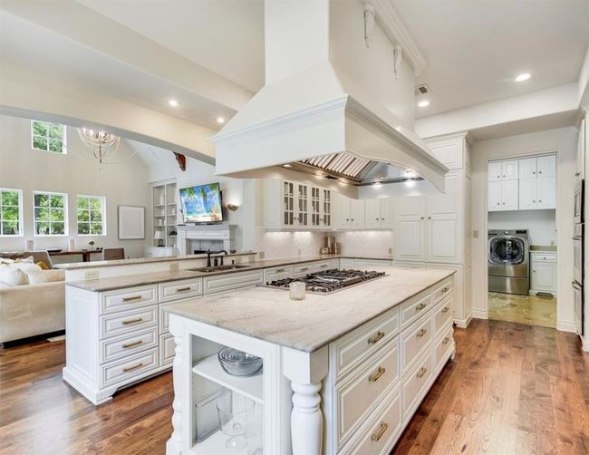 Open concept kitchen opens to family room. | Image 11