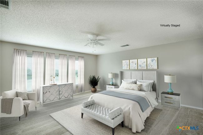 Virtually staged Primary Bedroom that will accomodate oversized furniture and space for sitting area | Image 17