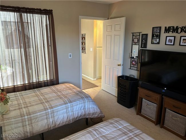 Bedroom featuring carpet | Image 28