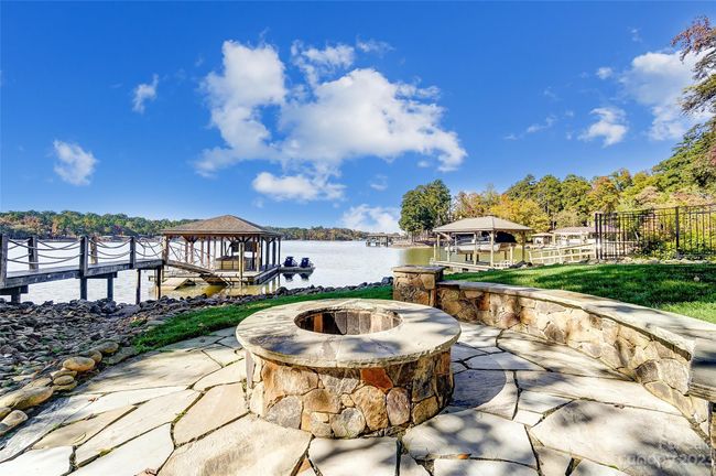 Cozy around the stone firepit on cool evenings | Image 36