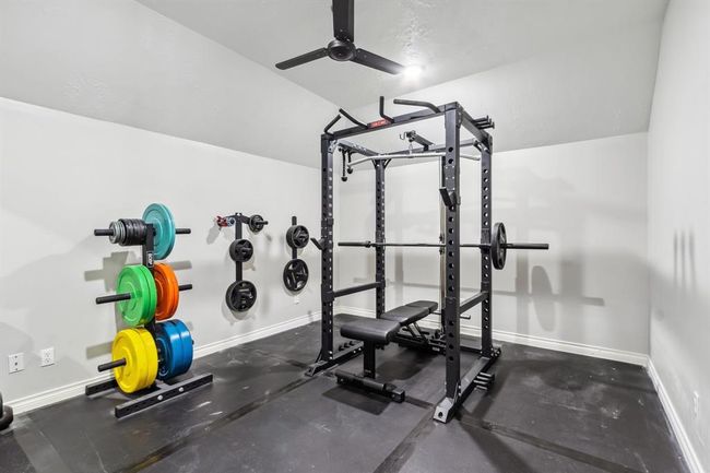 Equally adaptable as a home gym or a dedicated media room, this space offers multiple possibilities. | Image 29
