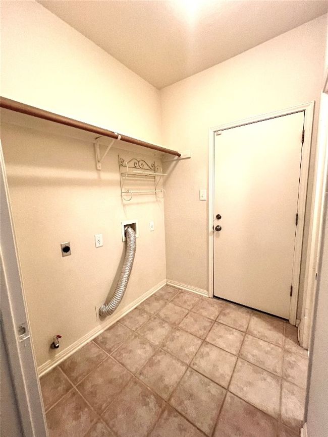 Laundry room with hook ups for both electric or natural gas dryer! | Image 26