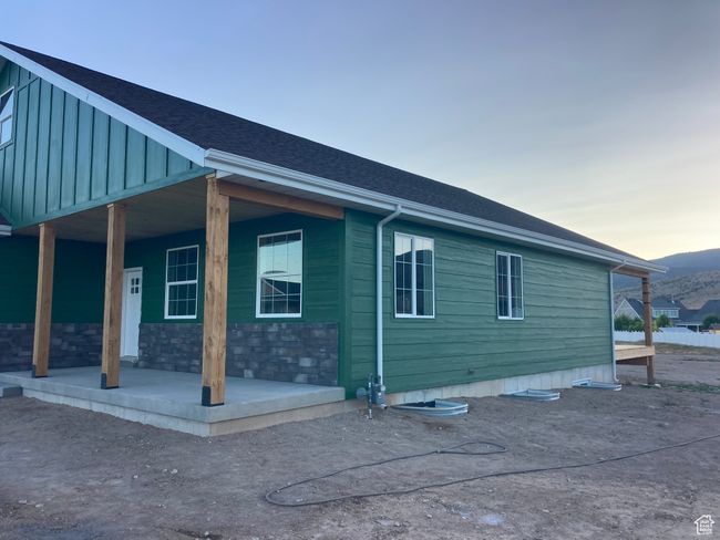 View of side of home with a porch | Image 9