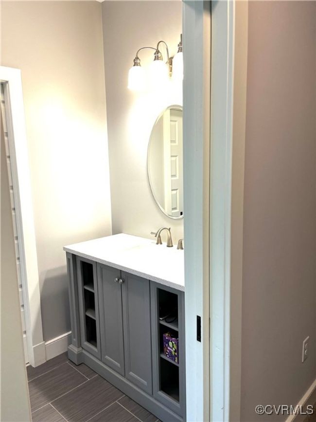 Bathroom with vanity and wood finished floors | Image 20