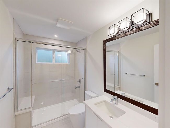 Full bathroom with a shower stall and vanity | Image 34