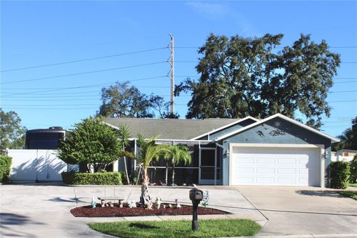 1521 Foxcroft Dr W, Palm Harbor, FL, 34683-5622 | Card Image