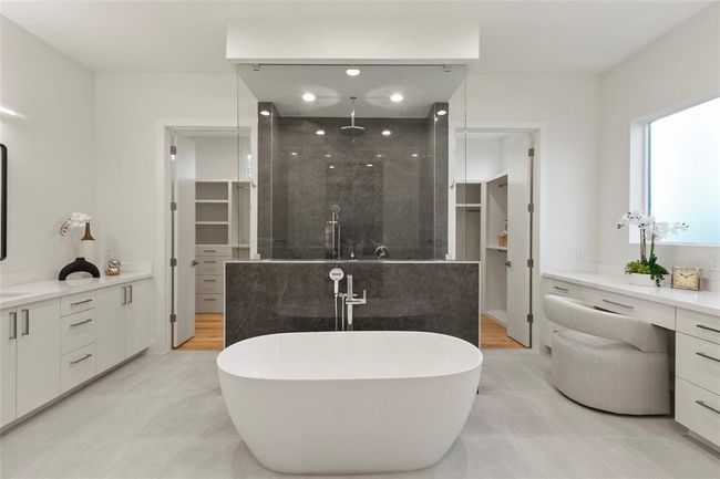 Luxury primary bedroom bath with spa tub | Image 15