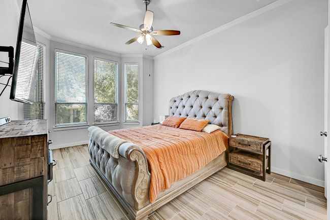 The private owner’s suite offers a serene retreat with a spacious layout and a large walk-in closet for all your storage needs. | Image 12