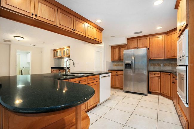 13310 Golf Crest Cir, House other with 6 bedrooms, 3 bathrooms and null parking in TAMPA FL | Image 15