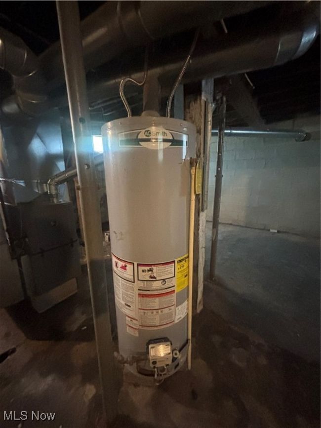 Utilities featuring gas water heater | Image 12