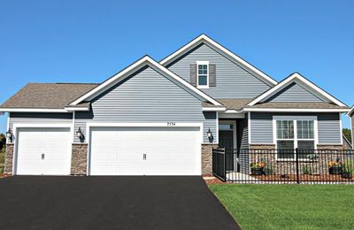 Welcome home to the Clayton American Classic at Ravine Crossing in Cottage Grove! Photo is of model home. Options and colors may vary. Ask Sales Agent for details. | Image 1