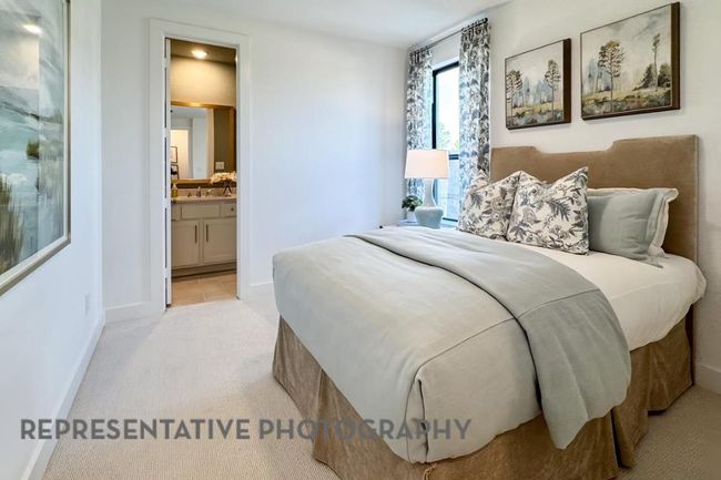 Bedroom with light colored carpet and ensuite bath | Image 24