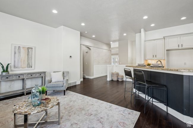 Great room with dark hardwood / wood-style floors | Image 11
