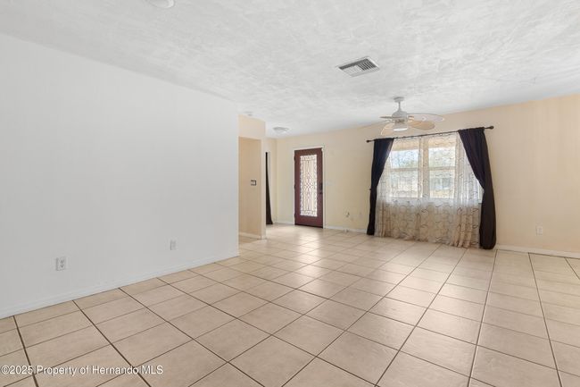 7464 Acorn Cir, House other with 3 bedrooms, 2 bathrooms and null parking in SPRING HILL FL | Image 5