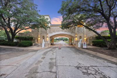 This condo is above the gate. You do not hear cars and it is very private with no shard walls. | Image 1