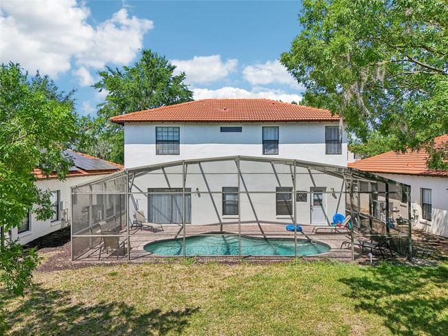 Screened-in Pool View from Back Yard | Image 38