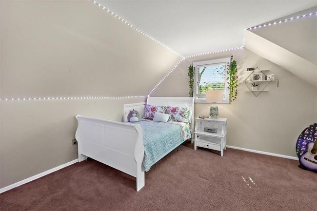 2nd Floor Carpeted bedroom with vaulted ceiling | Image 19