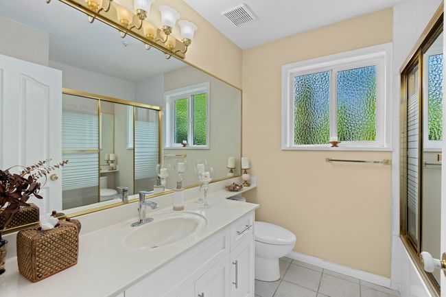 Bathroom with vanity and tile patterned floors | Image 16