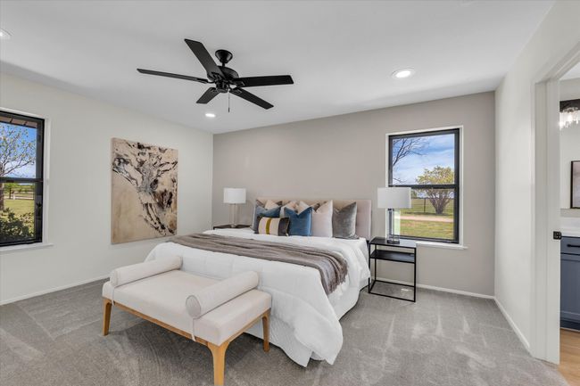 Bedroom with light carpet, recessed lighting, baseboards, and ceiling fan | Image 35