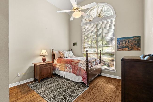 Downstairs secondary bedroom and a full bath just outside this room. | Image 19