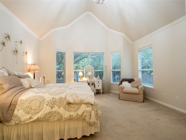 Spacious primary bedroom with room for a sitting area. | Image 14