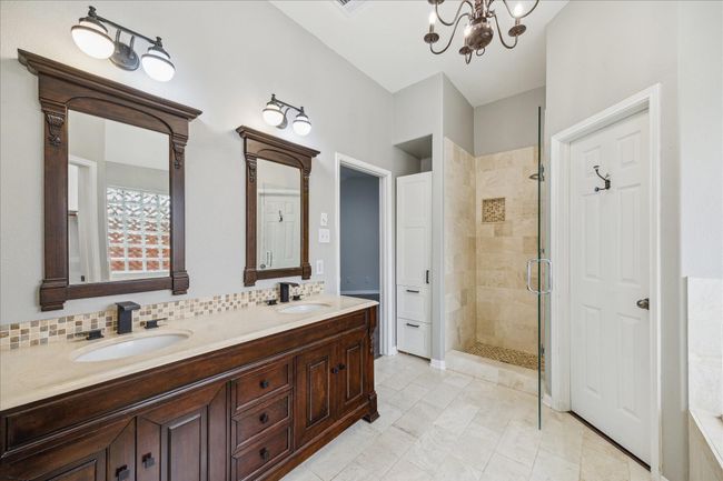 Dual sink on primary bath with separate shower and jetted tub | Image 22