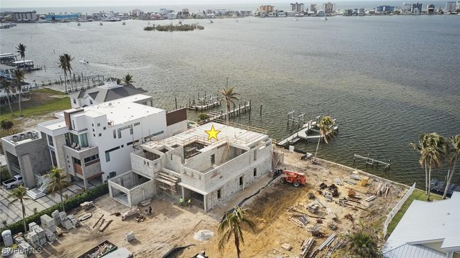 View of urban area featuring a nearby body of water | Image 33