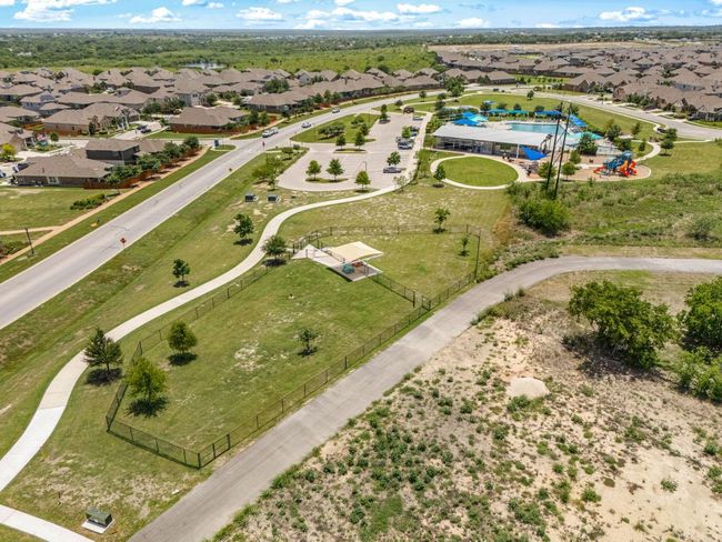 Aerial perspective of suburban area featuring a pool area | Image 35