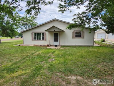 282 Elm Ave, Home with 3 bedrooms, 2 bathrooms and null parking in Akron CO | Image 1