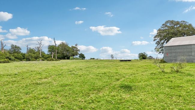 View of grassy yard featuring a view of rural / pastoral area | Image 27