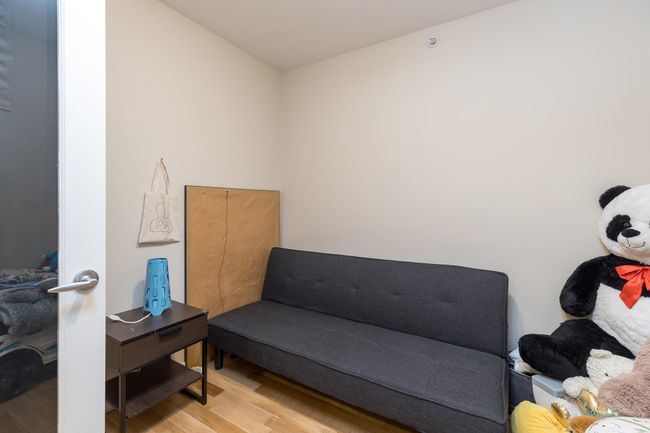 Living area with light wood-style flooring | Image 26