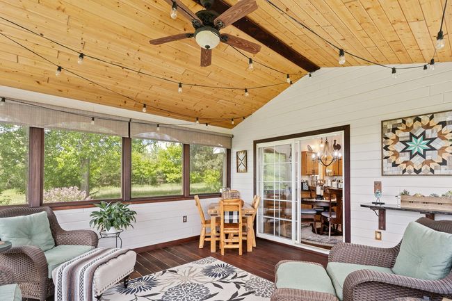 New custom window treatment in the porch | Image 14