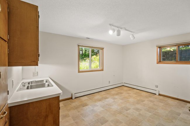 Lower level bedroom w/sink | Image 33