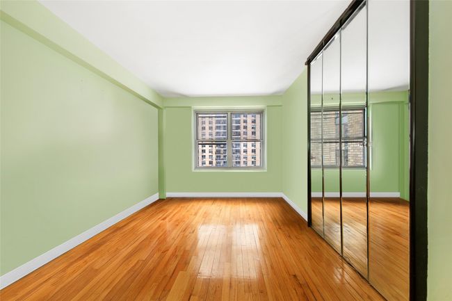 Spare room with light wood-type flooring | Image 5
