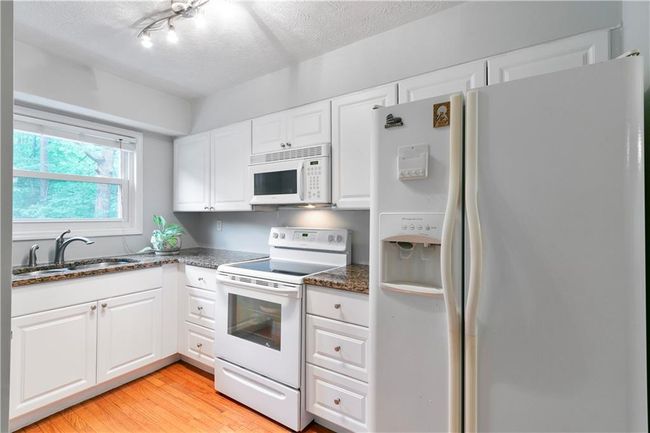 3571 Splinterwood Rd, Condo with 3 bedrooms, 3 bathrooms and 2 parking in Peachtree Corners GA | Image 4