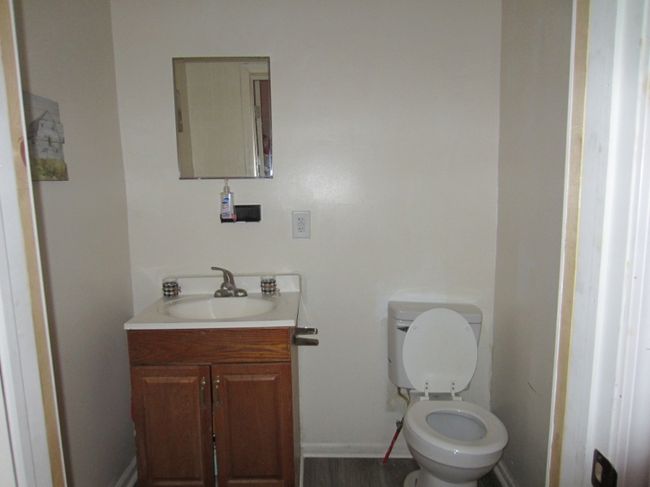 This half bath is from 326. Vanity in 328 is white | Image 11